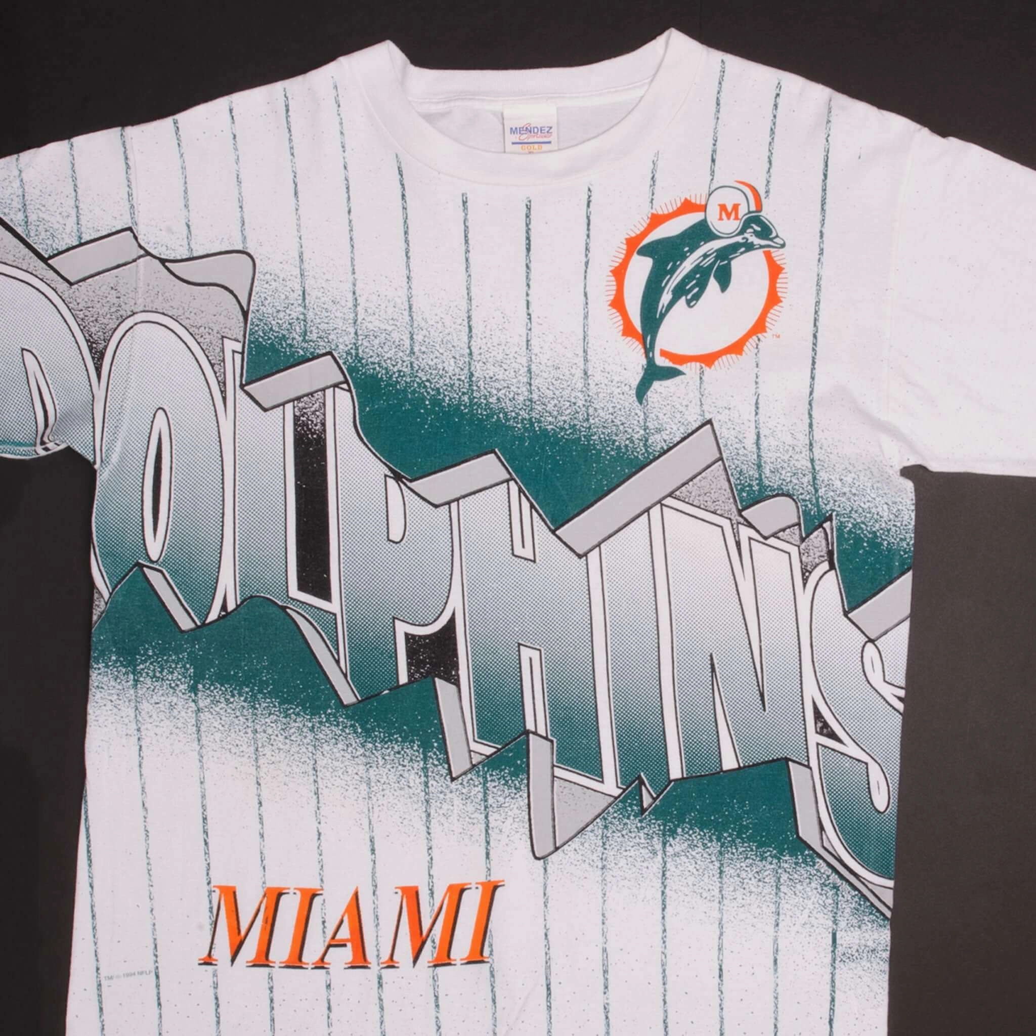 monochromatic VINTAGE ALL OVER PRINT NFL MIAMI DOLPHINS TEE SHIRT 1994 XL MADE USA