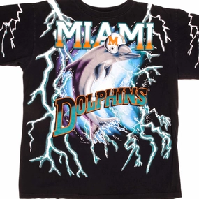 Trendy Layering VINTAGE ALL OVER PRINT NFL MIAMI DOLPHINS THUNDER TEE SHIRT 1993 SIZE LARGE MADE IN USA.